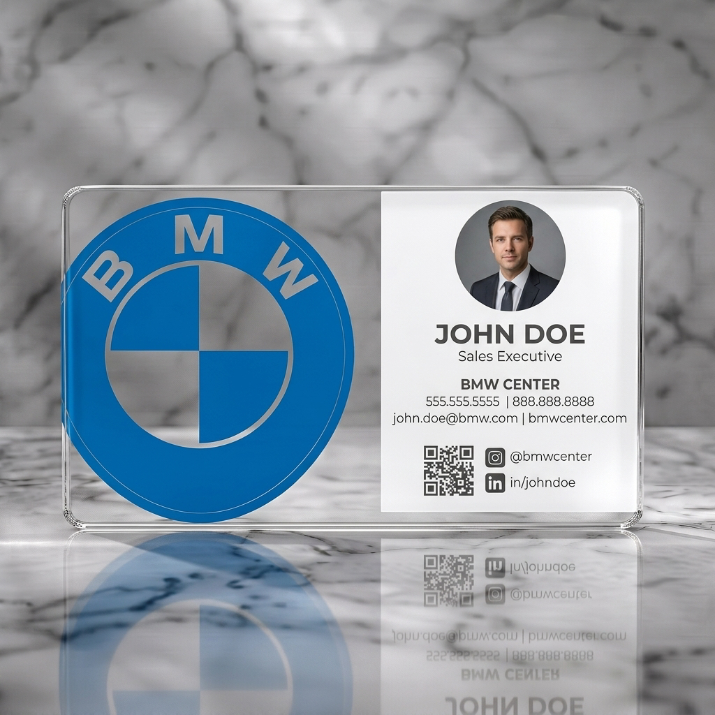 Clear plastic business card featuring clean, modern design showcasing BMW logo, professional sans-serif text, and social media icons
