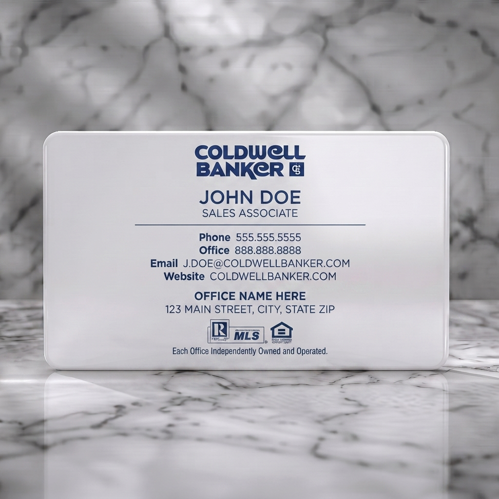 Solid white PVC business card featuring coldwell Banker blue, sans-serif typography, Realtor, MLS, and EHO icons on a clean white background