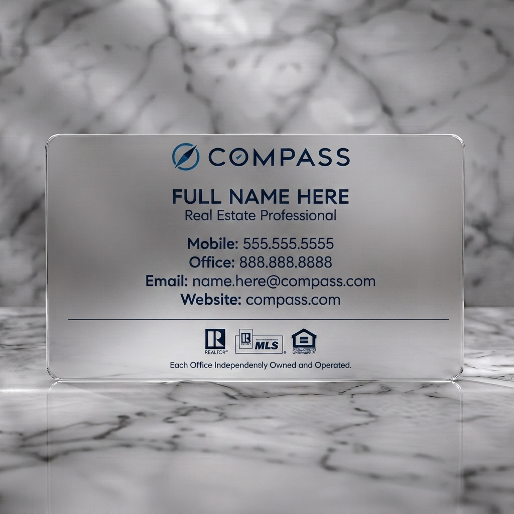 Frosted translucent plastic business card featuring minimalist white and dark blue design, sans-serif typography, Compass logo, and real estate icons