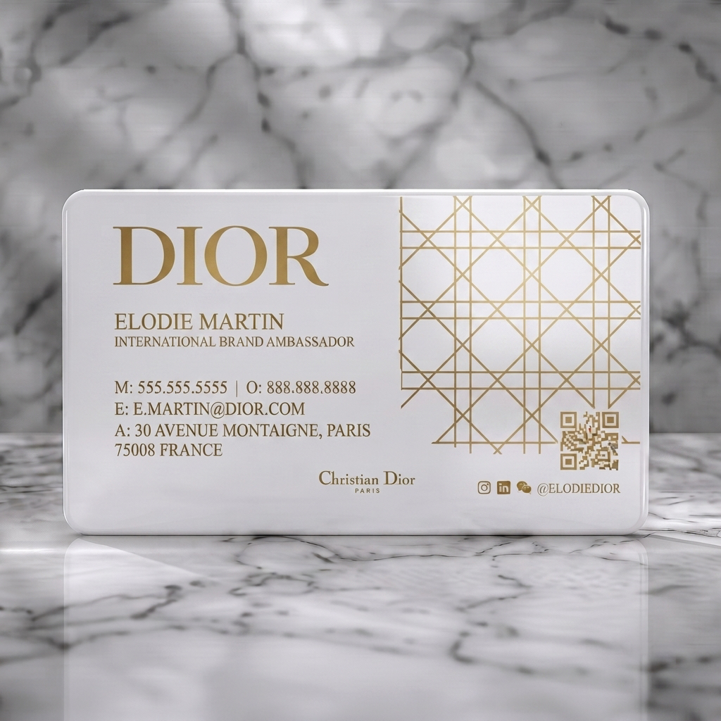 Solid white PVC business card featuring luxurious black and gold design, embossed Cannage pattern, elegant typography, and gold icons