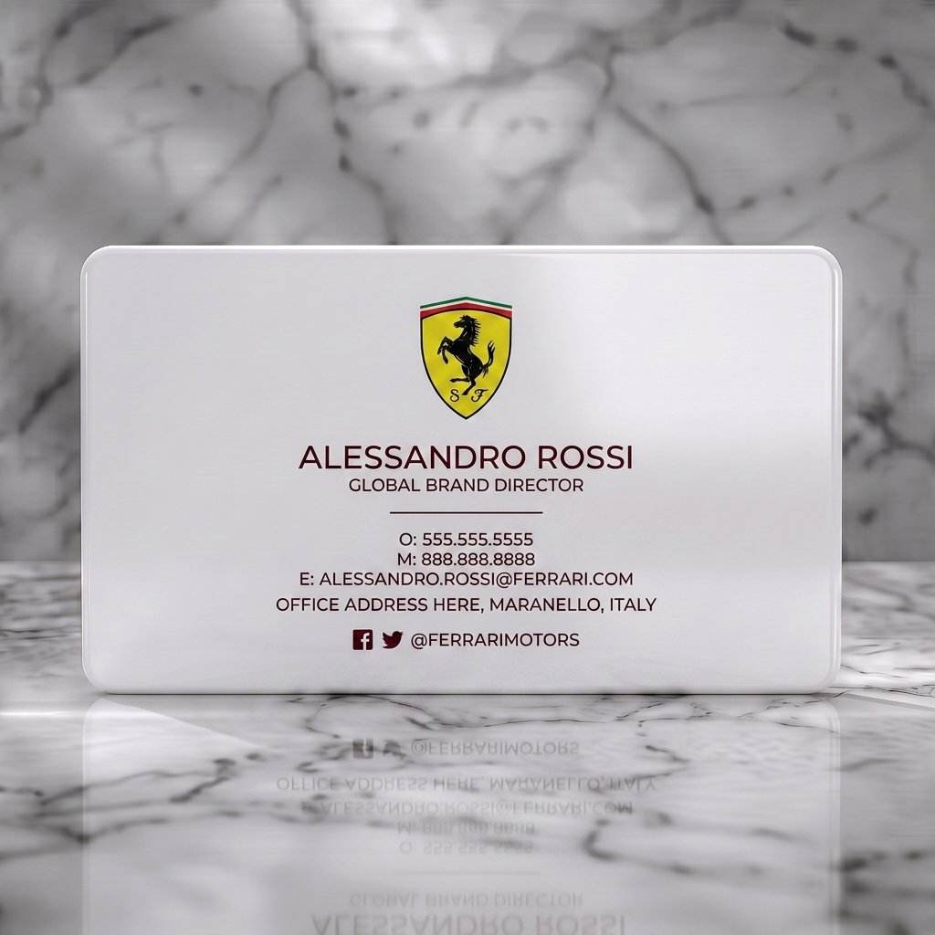 Solid white PVC business card featuring ferrari Prancing Horse logo, clean white sans-serif typography, social media icons, and a dark red border
