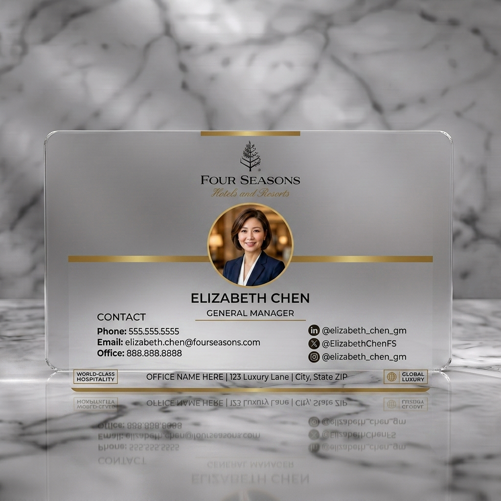 Frosted translucent plastic business card featuring elegant white and gold design with serif and sans-serif fonts, professional photo, and social media icons