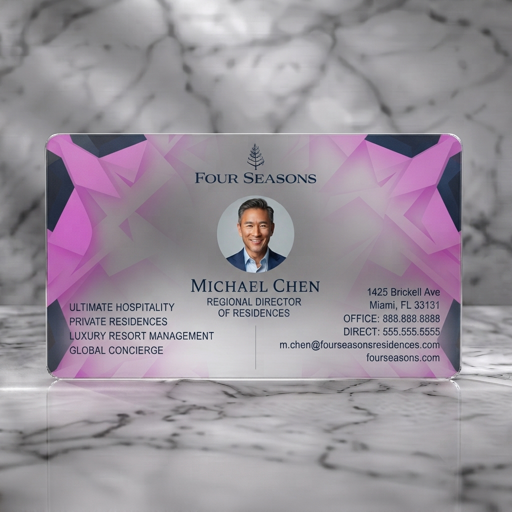 Frosted translucent plastic business card featuring modern geometric navy/white pattern, elegant fonts, luxury brand logo, professional headshot