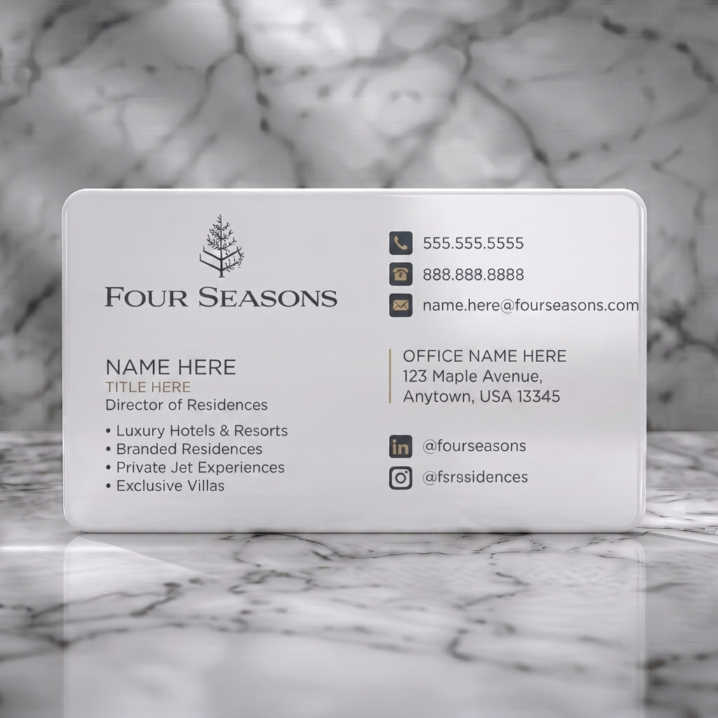 Solid white PVC business card featuring clean, minimalist design, charcoal and off-white palette, elegant serif/sans-serif typography, and key contact icons