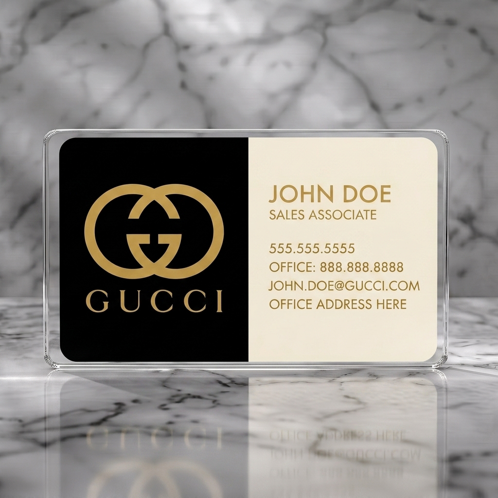 Clear plastic business card featuring a luxurious black and off-white split design, gold Gucci logo, and elegant sans-serif text