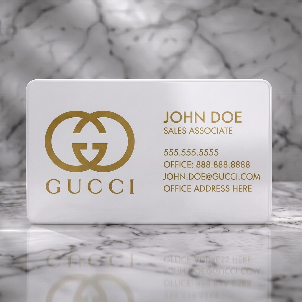 Solid white PVC business card featuring a luxurious black and off-white split design, gold Gucci logo, and elegant sans-serif text