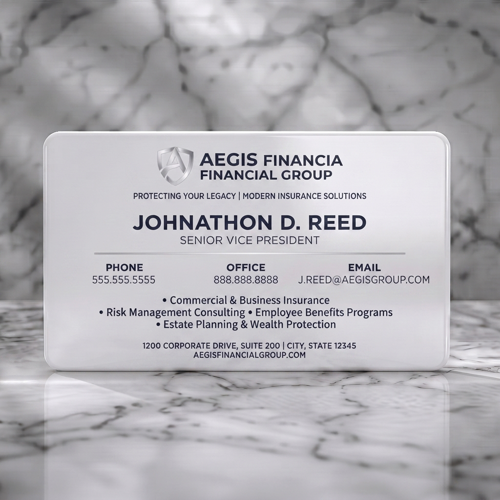 Solid white PVC business card featuring modern, professional design featuring a metallic shield logo, bold sans-serif typography, and deep indigo text