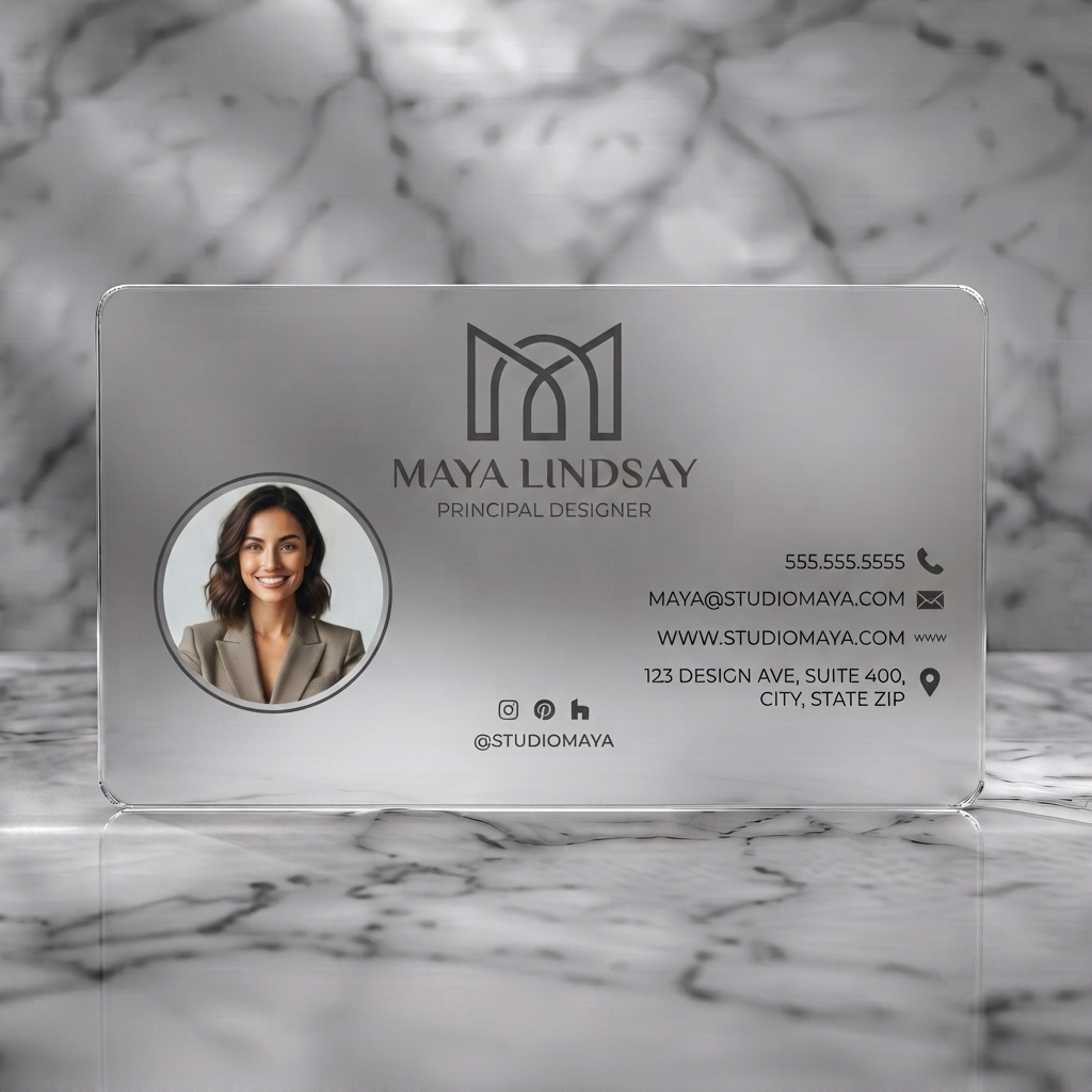 Frosted translucent plastic business card featuring modern, minimalist design in monochrome, a geometric 'M' logo, sans-serif fonts, and relevant contact icons