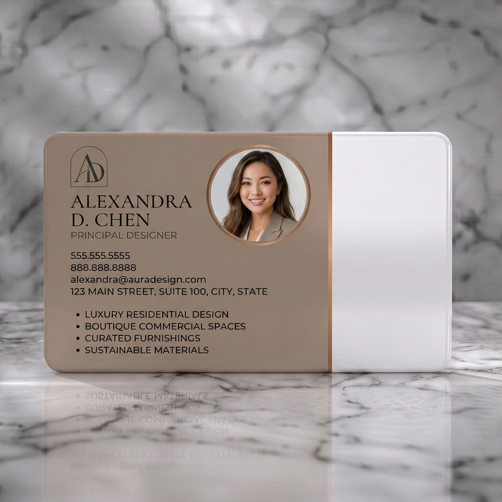 Solid white PVC business card featuring elegant design with a professional portrait, warm beige and black colors, and classic serif typography