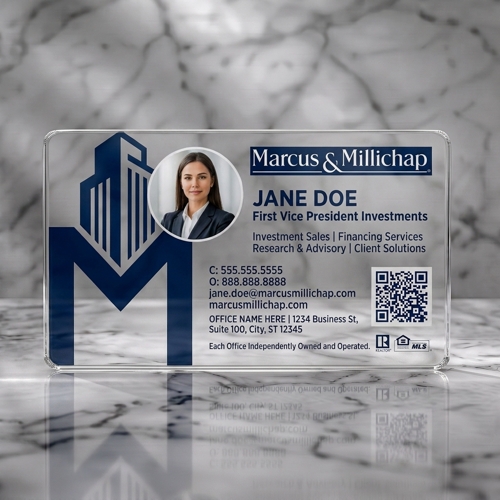 Clear plastic business card featuring professional design with a prominent M-building logo, photo, dark blue & white branding, QR code & industry icons