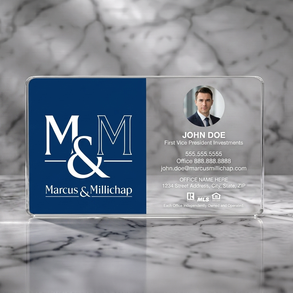 Clear plastic business card featuring a professional navy and white design with elegant typography, a photo, and real estate icons