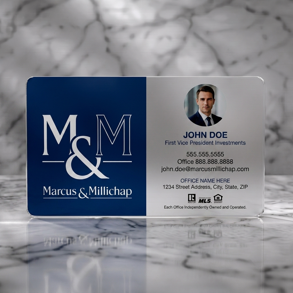 Frosted translucent plastic business card featuring a professional navy and white design with elegant typography, a photo, and real estate icons