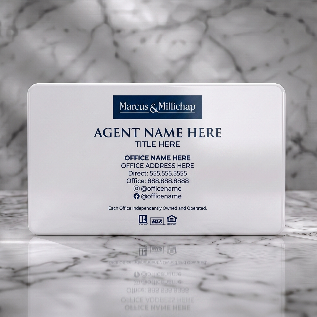 Solid white PVC business card featuring marcus & Millichap branding, navy/white palette, elegant serif & modern sans-serif fonts, real estate icons