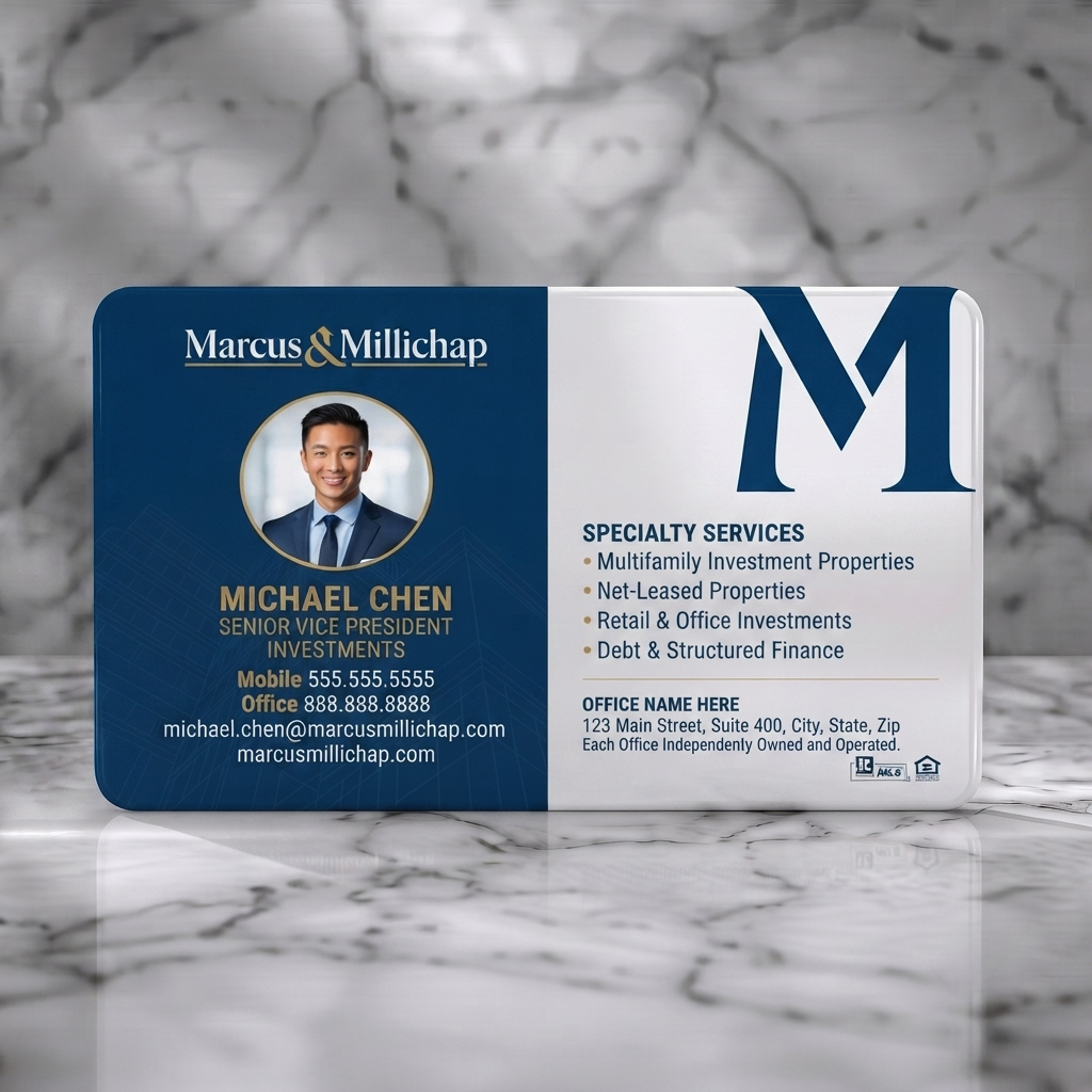Solid white PVC business card featuring a split-panel design with deep navy and white, gold accents, professional typography, and real estate icons