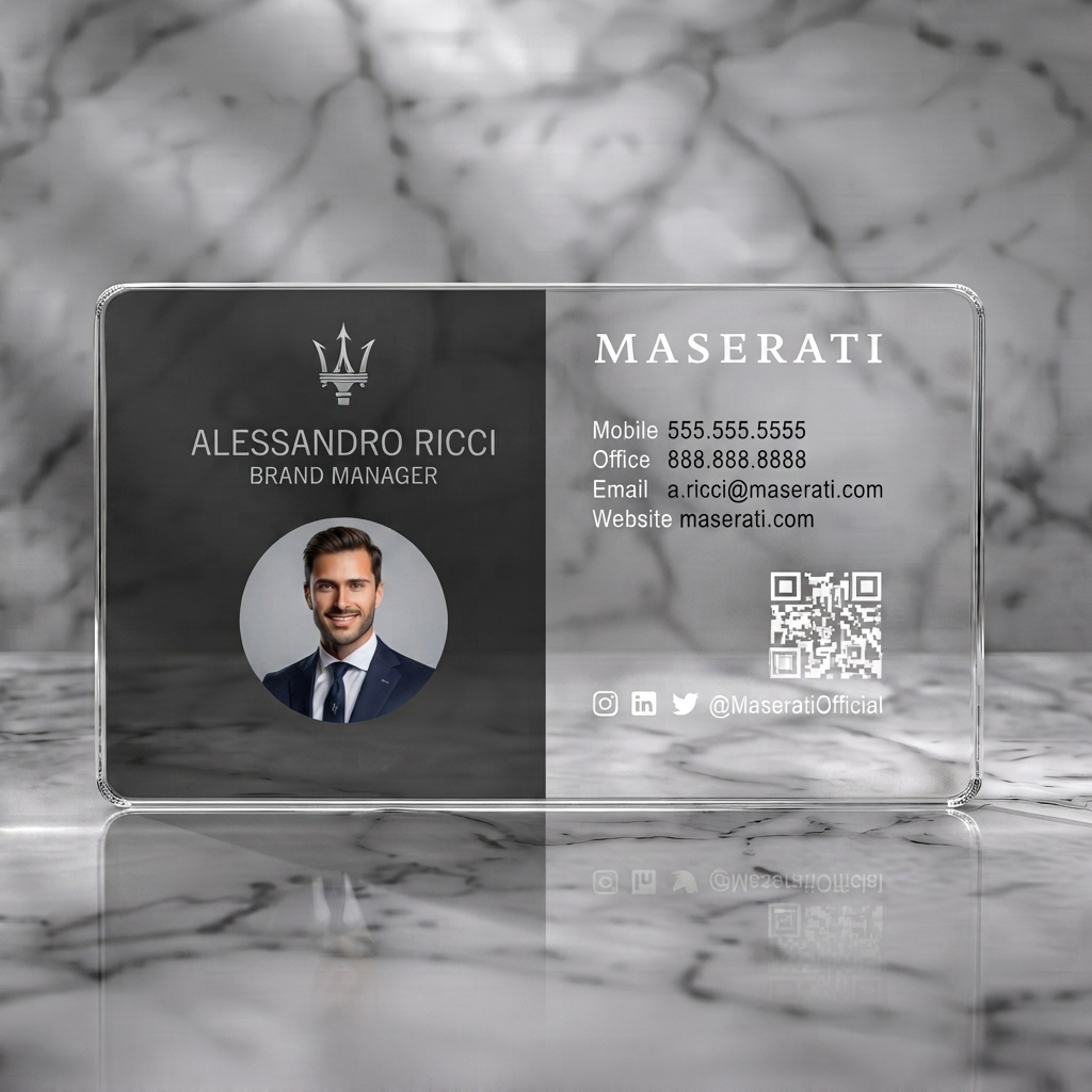 Clear plastic business card featuring a minimalist black/white split-panel design featuring silver Maserati logo, dark blue typography, photo, and social icons