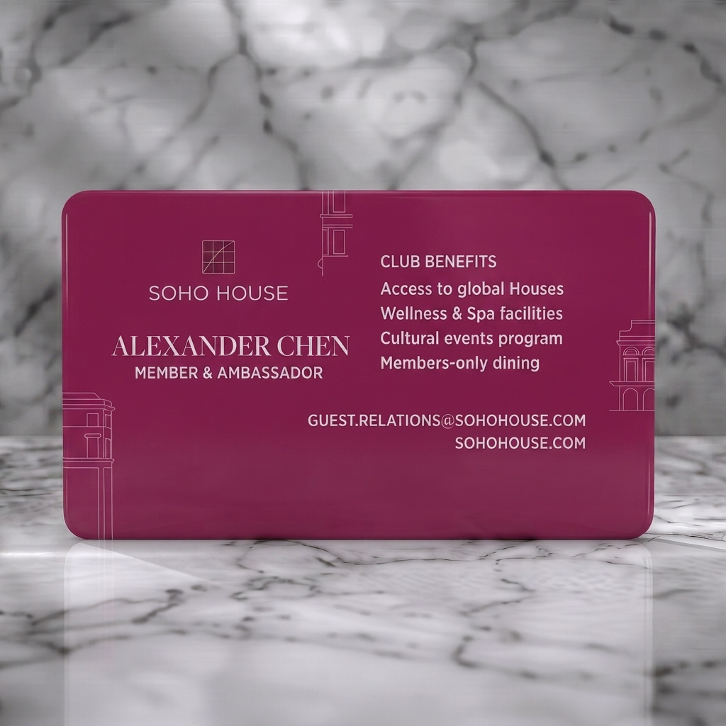 Solid white PVC business card featuring white typography and architectural line art with an elegant grid logo and mixed serif/sans-serif fonts
