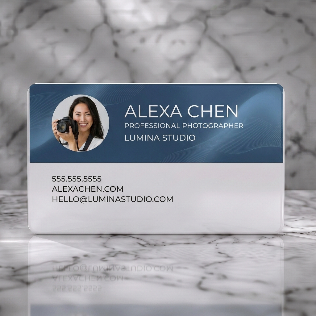 Solid white PVC business card featuring a dark blue background with subtle waves, circular photo, and white sans-serif text