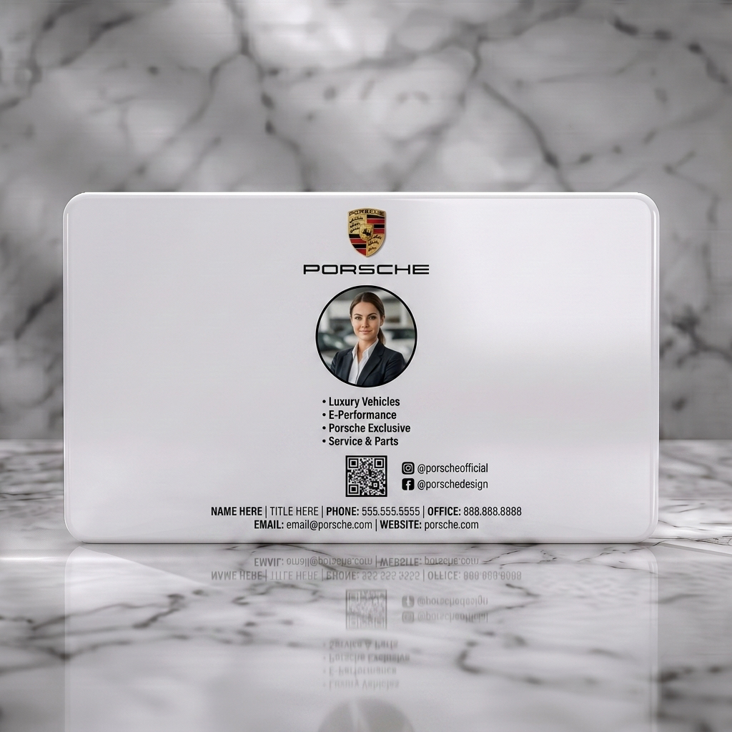 Solid white PVC business card featuring porsche logo, clean layout, white text, employee photo, QR code, and social media icons