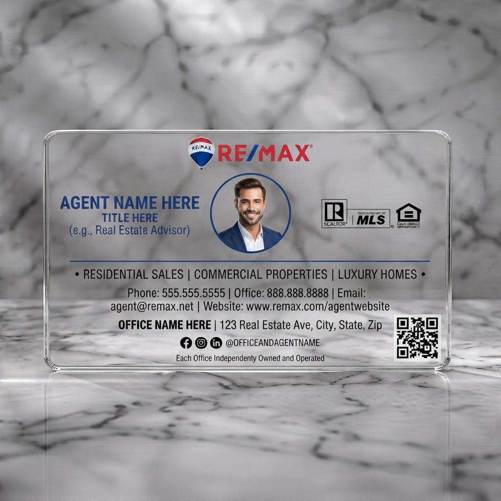 Clear plastic business card featuring clean layout, circular agent photo, RE/MAX red/blue branding, dark blue sans-serif text, and industry icons
