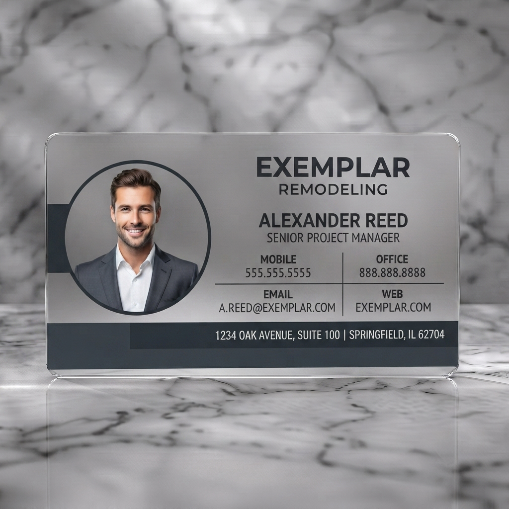 Frosted translucent plastic business card featuring a modern layout with a professional headshot, contrasting dark grey and white text on a clean background, using sans-serif fonts