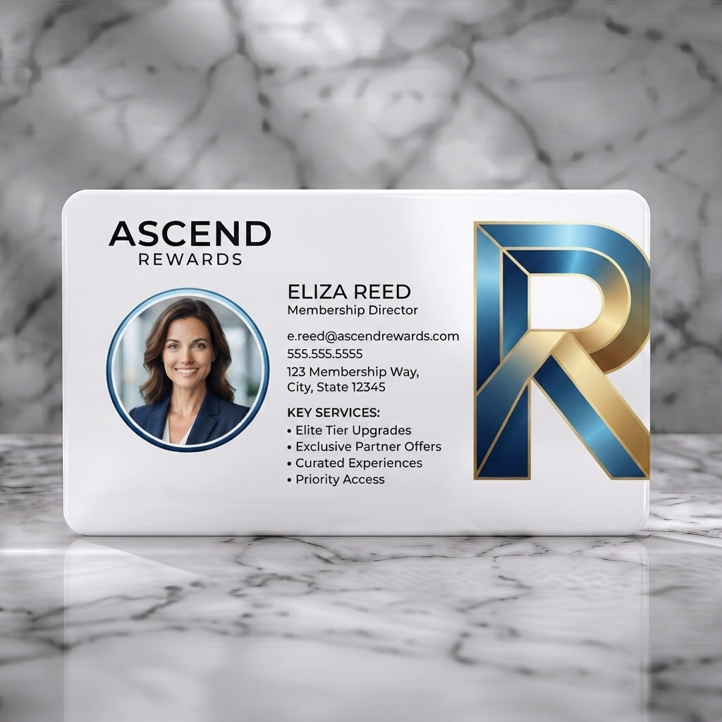 Solid white PVC business card featuring elegant blue and gold 'R' logo, crisp sans-serif text, and a professional headshot