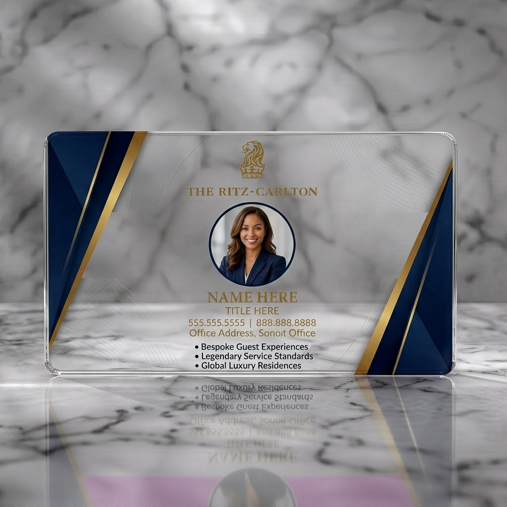 Clear plastic business card featuring luxurious navy and gold design with Ritz-Carlton logo, elegant typography, and professional portrait