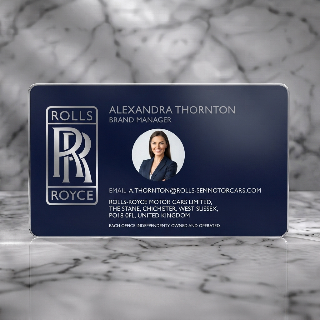 Frosted translucent plastic business card featuring elegant, minimalist design; navy and silver branding; clean sans-serif typography; Rolls-Royce logo and photo