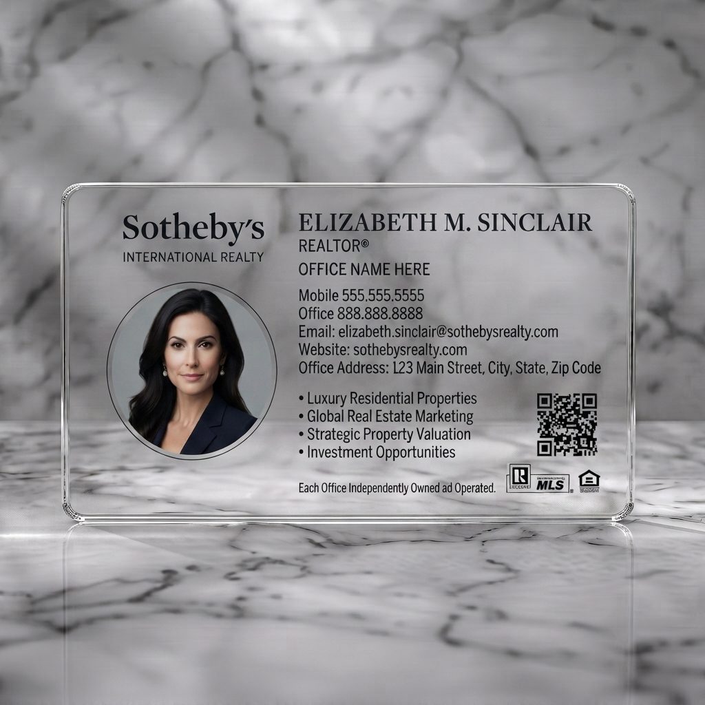Clear plastic business card featuring elegant, minimalist design with classic black typography, circular photo, QR code, and realty icons