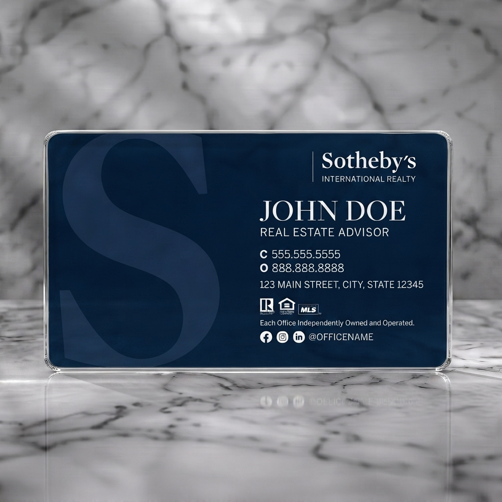 Clear plastic business card featuring a sophisticated navy design, elegant serif and clean sans-serif typography, and subtle realty/social icons