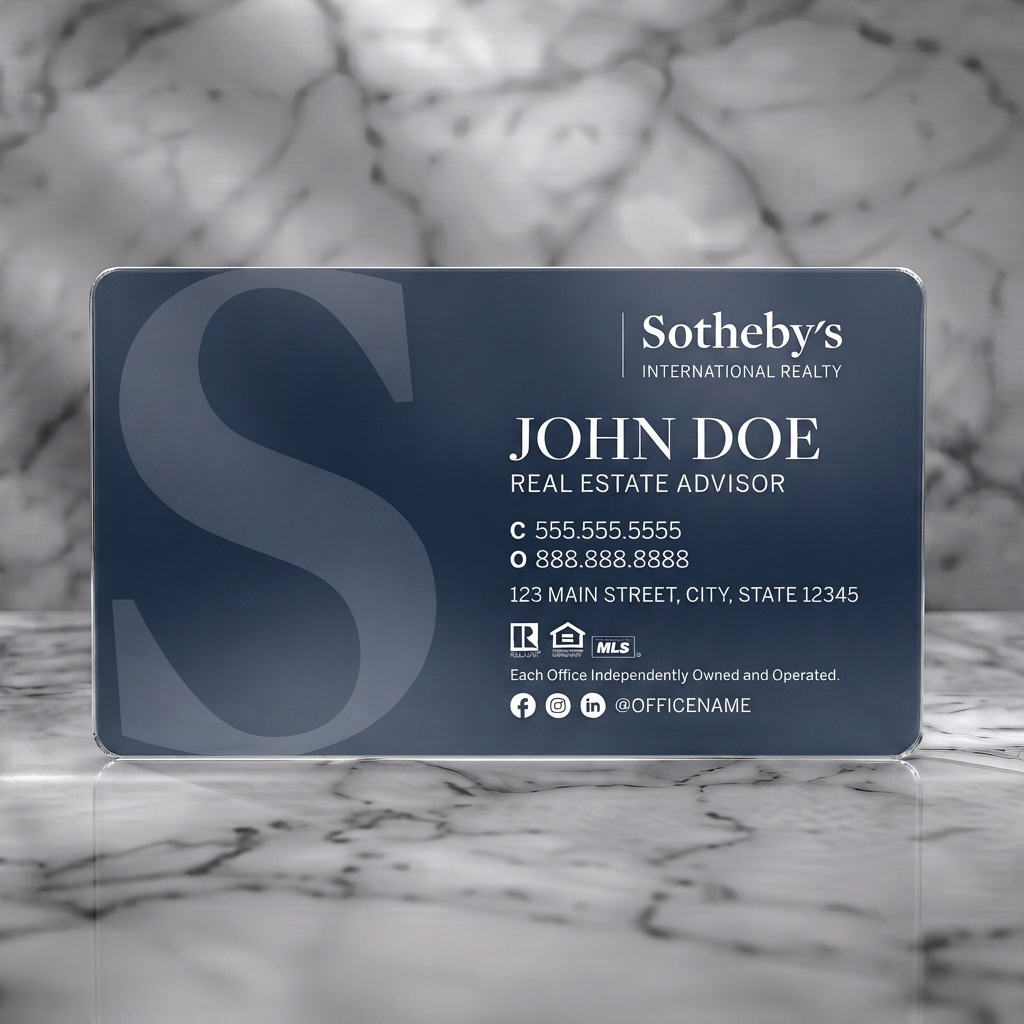 Frosted translucent plastic business card featuring a sophisticated navy design, elegant serif and clean sans-serif typography, and subtle realty/social icons