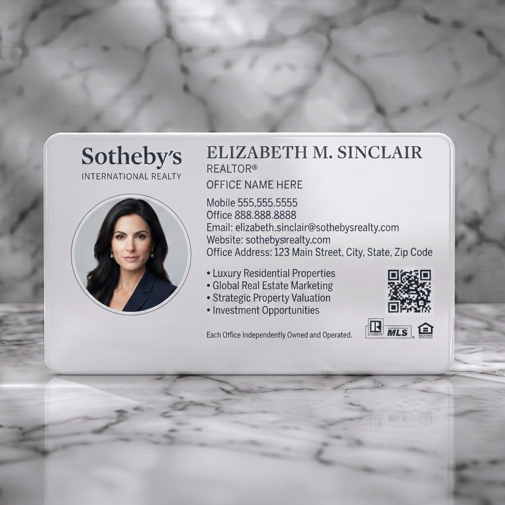Solid white PVC business card featuring elegant, minimalist design with classic black typography, circular photo, QR code, and realty icons