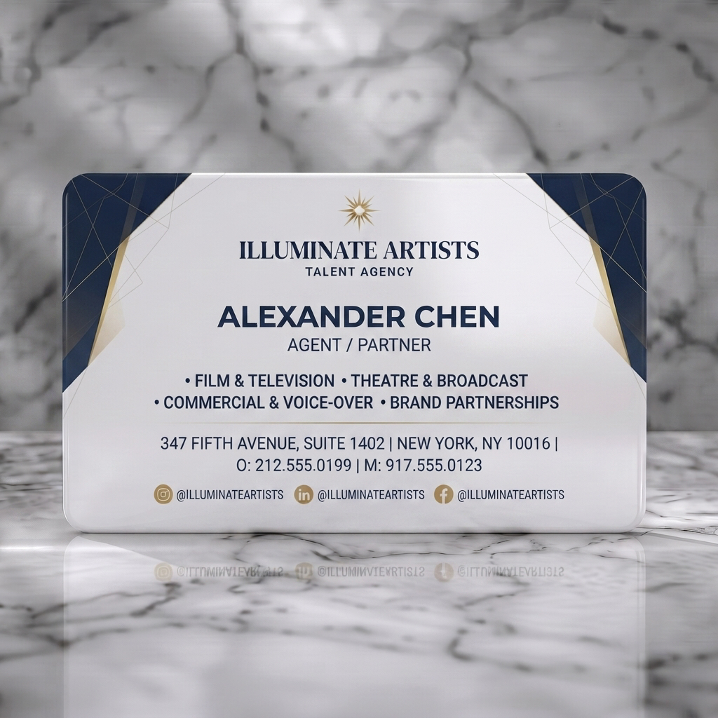 Solid white PVC business card featuring modern geometric design with navy and gold accents, clean sans-serif typography, a sunburst logo, social media icons