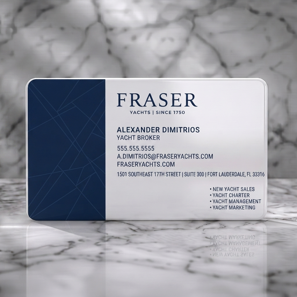 Solid white PVC business card featuring elegant navy and white design, subtle nautical geometric pattern, serif and sans-serif typography