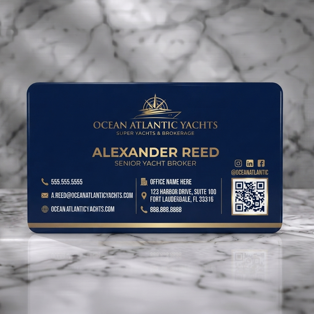 Solid white PVC business card featuring elegant navy and gold design, yacht logo, professional typography, and essential contact icons